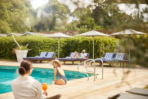 Indoor pool, seasonal outdoor pool, pool umbrellas, sun loungers