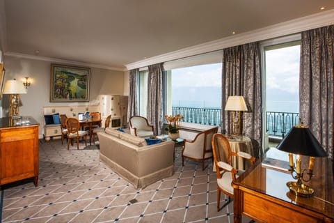 Executive Suite, Lake View | Minibar, in-room safe, soundproofing, iron/ironing board