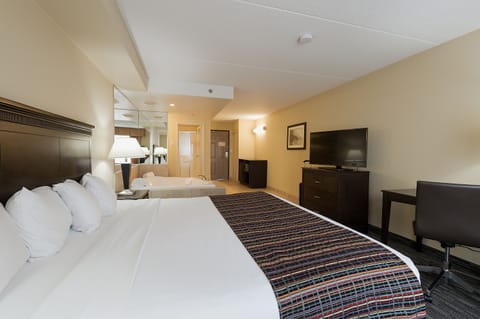 Suite, 1 King Bed, Non Smoking, Jetted Tub | Premium bedding, desk, laptop workspace, blackout drapes