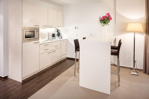 Exclusive Studio, Sauna | Private kitchen | Full-size fridge, microwave, stovetop, dishwasher