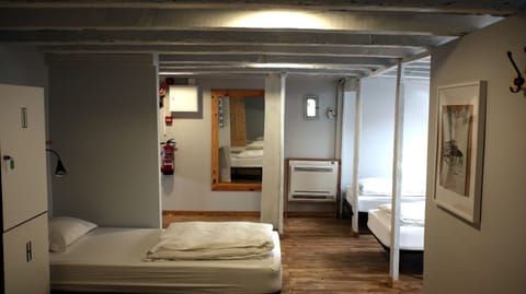 Shared Dormitory, Shared Bathroom (10 people) | In-room safe, iron/ironing board, free WiFi, bed sheets