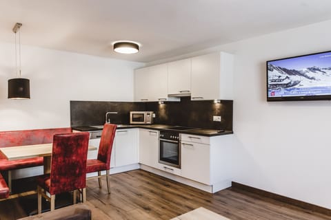 Apartment, 1 Bedroom (Top 4) (excluding cleaning fee 100 Euro) | Private kitchenette | Fridge, microwave, oven, stovetop