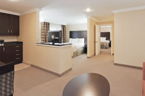 Suite, Multiple Beds | In-room safe, desk, laptop workspace, blackout drapes