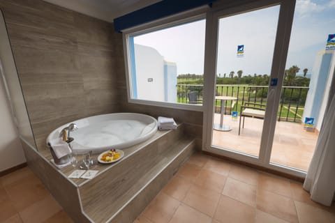 Junior Suite, Terrace | Deep soaking bathtub