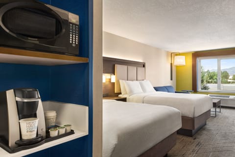 Suite, 2 Queen Beds | In-room safe, blackout drapes, iron/ironing board, free WiFi