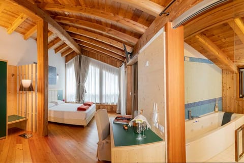 Suite, Jetted Tub | In-room safe, desk, free WiFi