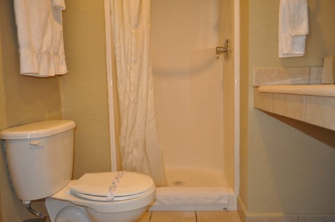 Combined shower/tub, hair dryer, towels, soap