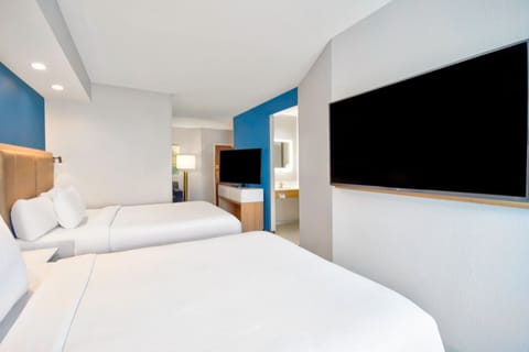 Suite, Multiple Beds | Down comforters, pillowtop beds, desk, laptop workspace