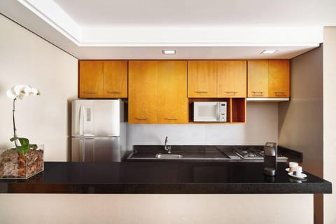 Deluxe Suite | Private kitchenette | Full-size fridge, microwave, stovetop