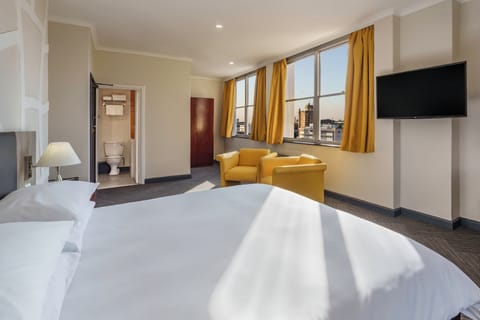 Suite, 1 Bedroom, City View | Premium bedding, in-room safe, desk, blackout drapes