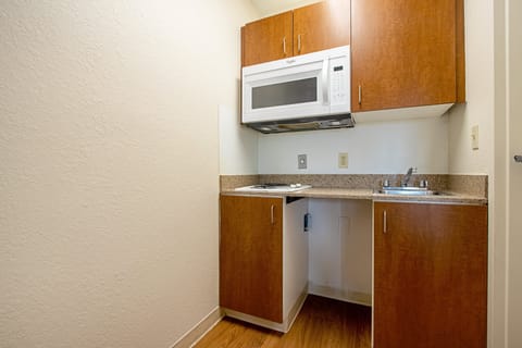 Suite, 2 Double Beds, Non Smoking | Private kitchenette | Fridge, microwave, stovetop