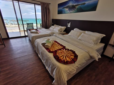 Seafront Villa | Minibar, in-room safe, desk, bed sheets