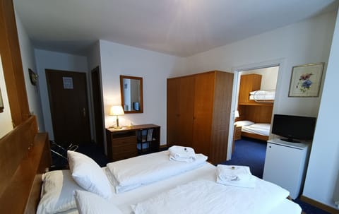 Family Room | Premium bedding, minibar, in-room safe, desk