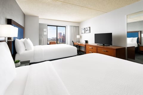 Premium bedding, down comforters, pillowtop beds, in-room safe