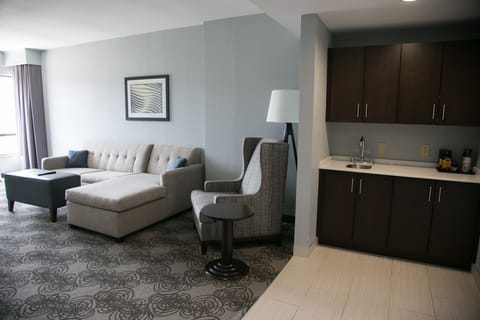 Suite, 1 King Bed with Sofa bed | Living area | 55-inch flat-screen TV with cable channels, TV, Netflix