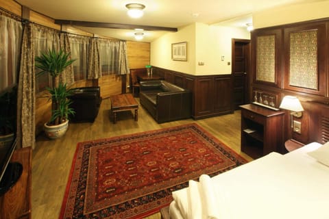 Deluxe Suite, Terrace | Minibar, blackout drapes, iron/ironing board, free cribs/infant beds