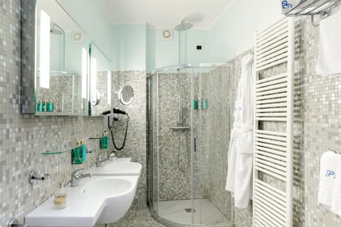 Junior Suite, 1 King Bed, Balcony, Partial Sea View | Bathroom | Shower, hair dryer, bathrobes, slippers