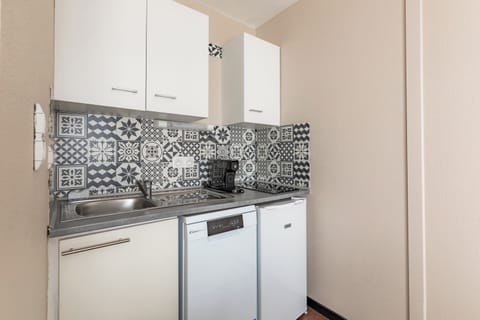 Two Bedrooms Apartment | Private kitchen | Fridge, microwave, dishwasher, coffee/tea maker