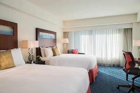 Premium bedding, pillowtop beds, minibar, in-room safe