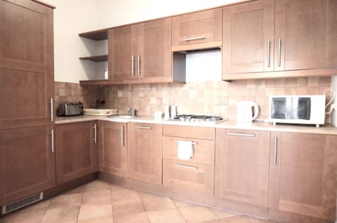 Apartment, 2 Bedrooms (Swietojanska 17) | Private kitchenette | Fridge, stovetop, coffee/tea maker, electric kettle