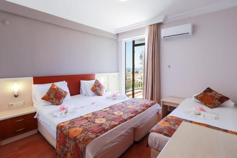 Standard Triple Room | Premium bedding, minibar, iron/ironing board, free rollaway beds