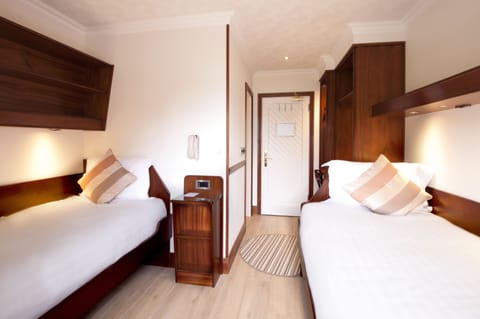 Twin Room (Annex 2 -mins walk from the main hotel) | In-room safe, desk, iron/ironing board, free WiFi