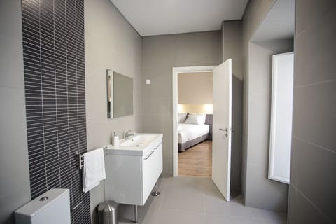 Superior Double or Twin Room, Kitchenette | Bathroom | Shower, free toiletries, hair dryer, bathrobes