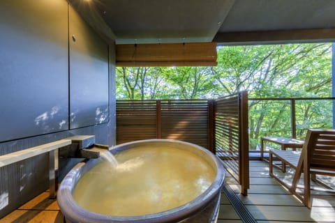 Deluxe Room, Non Smoking (Japanese Western, Outdoor Hot Spring) | Bathroom amenities | Free toiletries, hair dryer, slippers, electronic bidet