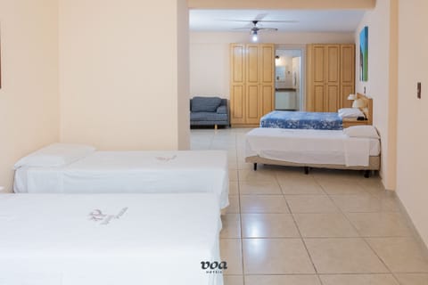 Family Room | Minibar, free WiFi, bed sheets