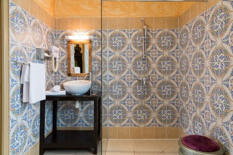 Shower, free toiletries, hair dryer, slippers