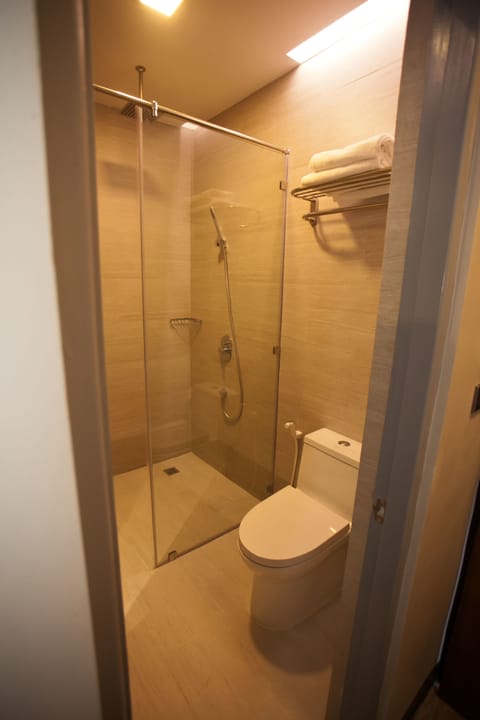 Standard Double Room | Bathroom | Shower, free toiletries, slippers, towels