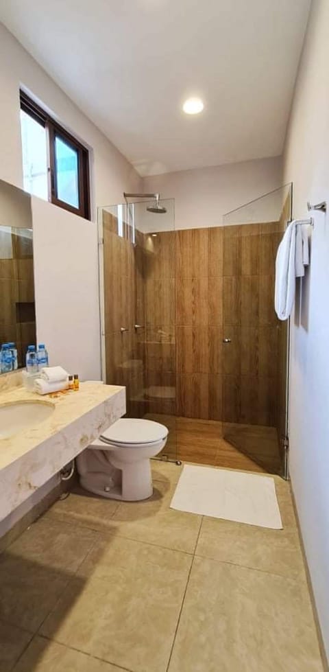 Luxury Suite, Private Pool | Bathroom | Shower, rainfall showerhead, hair dryer, towels