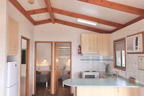 Deluxe Cabin, 2 Bedrooms, Ocean View | Private kitchen | Full-size fridge, microwave, electric kettle, toaster