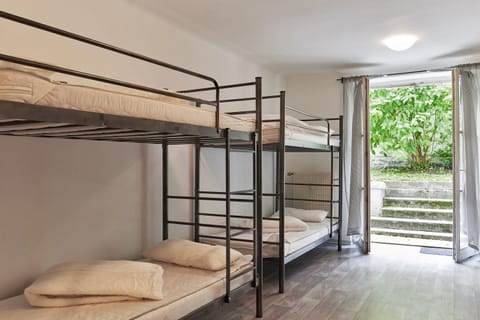 Shared Dormitory, Shared Bathroom (6 Bunk Beds) | 1 bedroom, in-room safe, desk, iron/ironing board