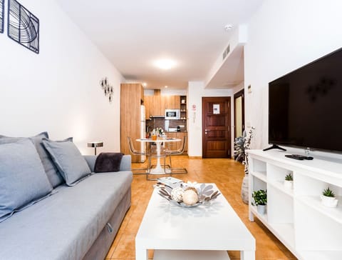 Superior Apartment, 1 Bedroom | Living room | 42-inch flat-screen TV with satellite channels, TV