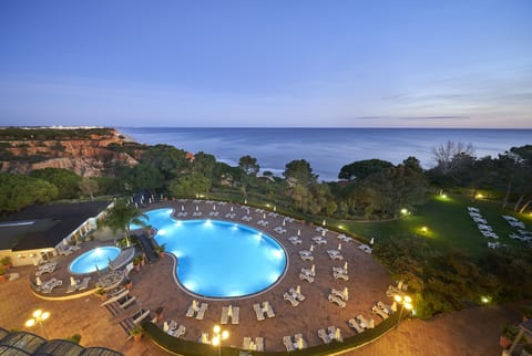 Indoor pool, outdoor pool, pool umbrellas