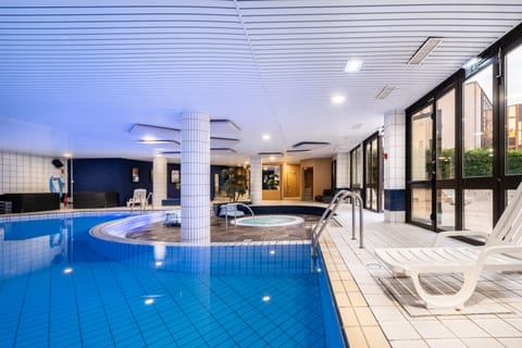 Indoor pool, open 8:00 AM to 9:00 PM, sun loungers