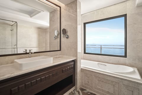 Junior Suite, 1 King Bed, Smoking, Ocean View (Balcony) | Bathroom | Separate tub and shower, deep soaking tub, designer toiletries