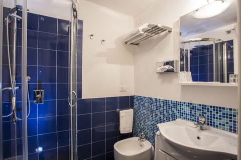 Suite, Balcony | Bathroom | Shower, free toiletries, slippers, bidet