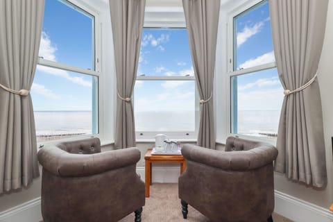 Family Room, Sea View (2nd floor) | Iron/ironing board, free WiFi, bed sheets