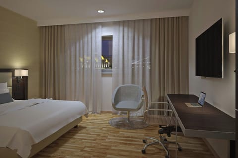 Down comforters, minibar, in-room safe, desk