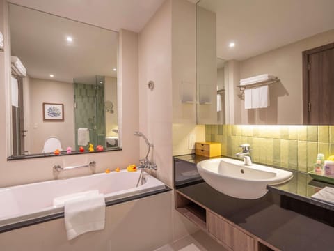 Deluxe Room, Multiple Beds | Bathroom | Shower, eco-friendly toiletries, hair dryer, bathrobes