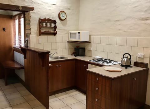 Romantic Cottage, 1 Bedroom (Stables Cottage) | Private kitchenette | Fridge, microwave, stovetop, coffee/tea maker