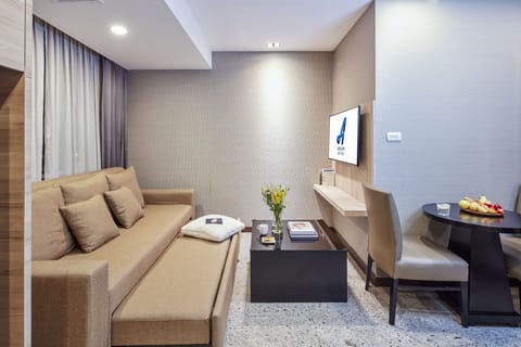 One Bedroom Suite | Living area | 43-inch Smart TV with satellite channels, TV