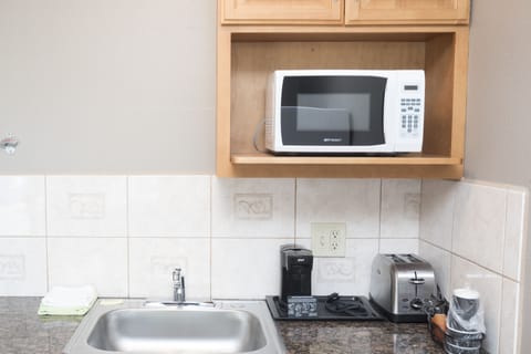 Suite, 2 Queen Beds, Non Smoking | 1 bedroom, premium bedding, iron/ironing board, free WiFi