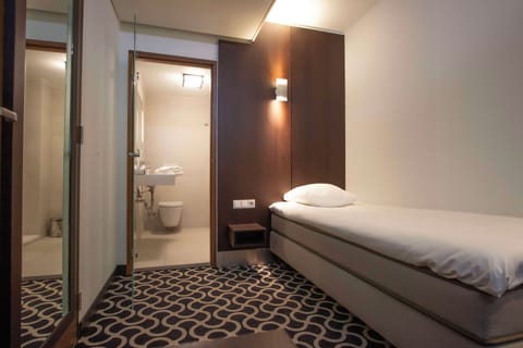 Desk, laptop workspace, blackout drapes, iron/ironing board