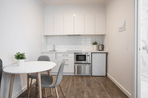 Accessible Studio Apartment Queen | Private kitchenette | Fridge, microwave, stovetop, dishwasher