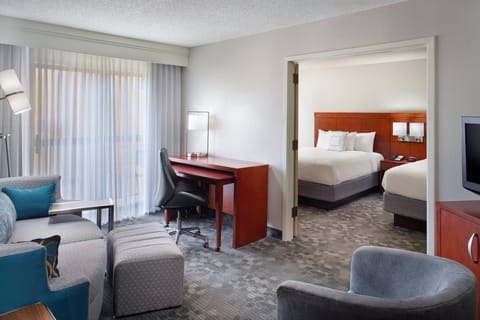 Suite, Multiple Beds | Premium bedding, memory foam beds, in-room safe, desk