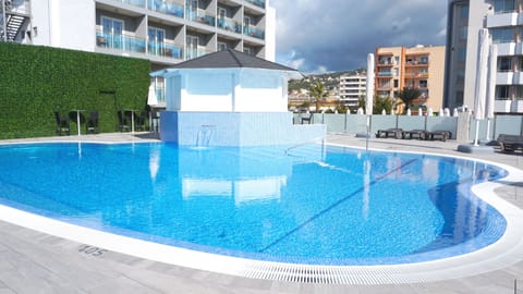 Indoor pool, 2 outdoor pools, pool umbrellas, sun loungers