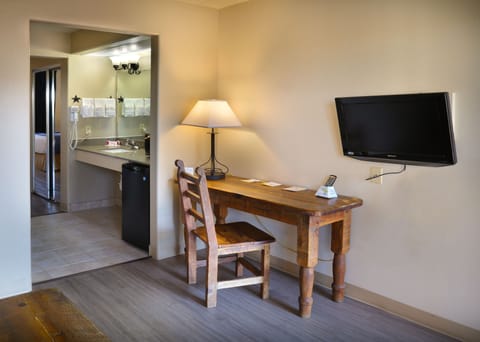 Suite, 1 King Bed, Non Smoking | Premium bedding, desk, iron/ironing board, free WiFi